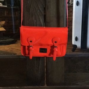 Neon orange Betseyville cross body purse.